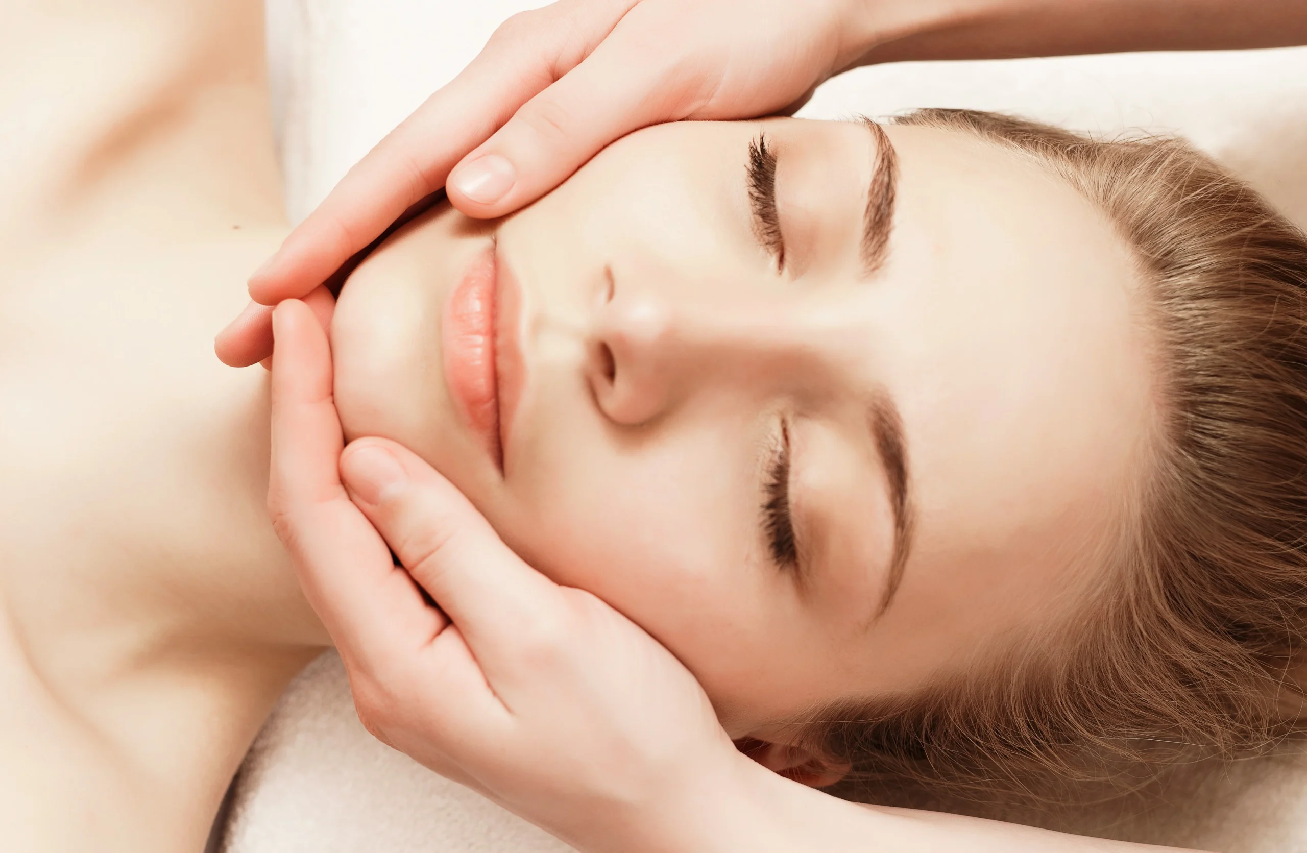 Patient getting facial treatment at Elysian Medspa & Rejuvenation Center