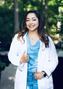 Portrait headshot of Dr. Roopsi Bring, MD, at Elysian Medspa & Rejuvenation Center.